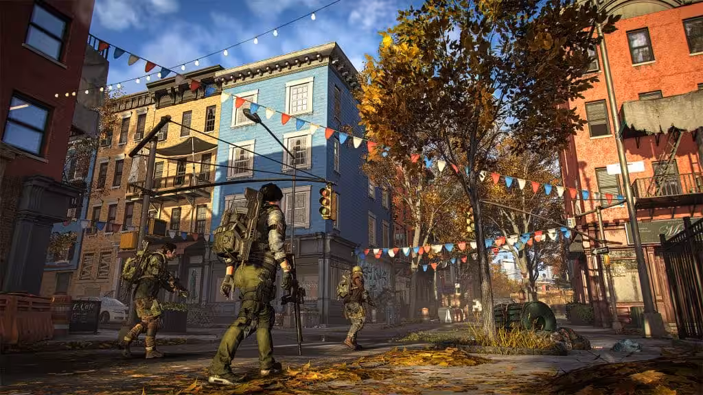 Three Division agents moving down a sunlit Washington DC street strung with bunting in The Division 2