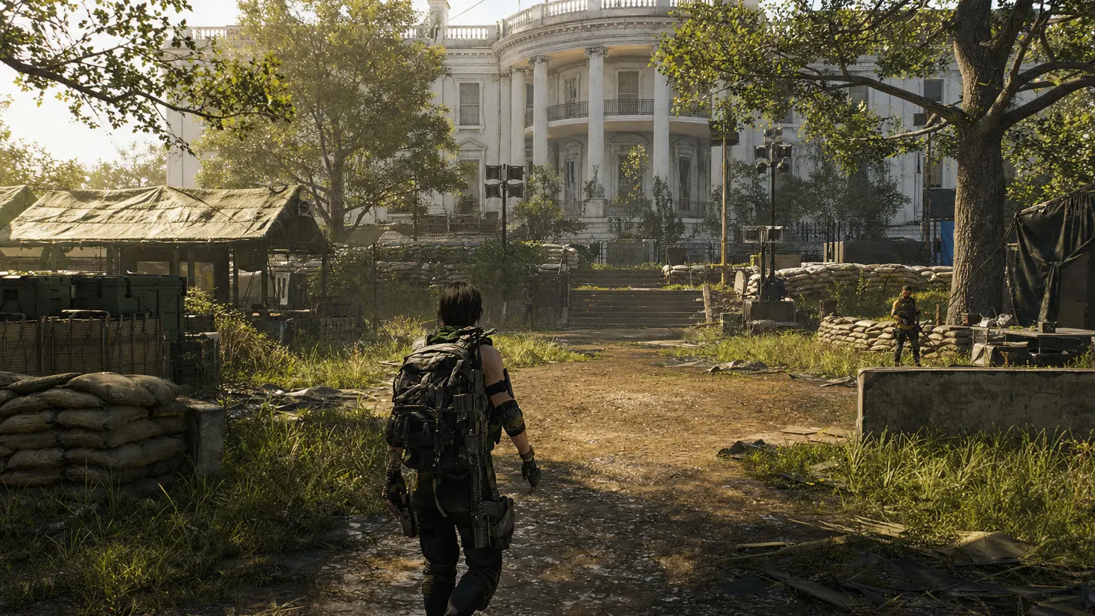 A lone Division 2 agent returns to the overgrown White House base of operations courtyard in morning light, sandbags, supply tents and a few