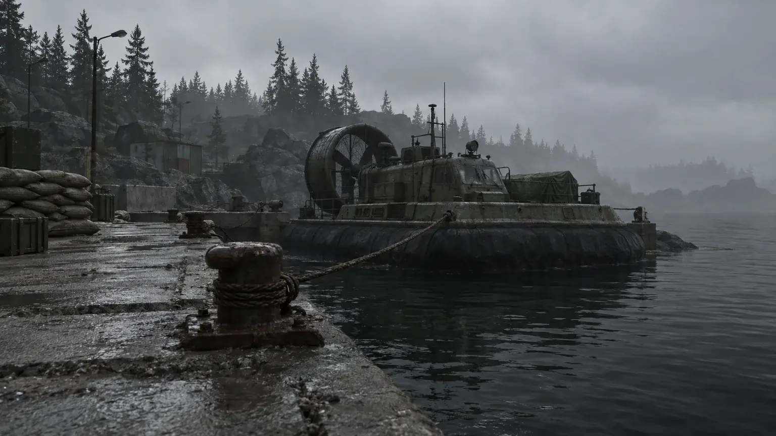 A hovercraft moored at a foggy coastal dock beneath an overcast sky.
